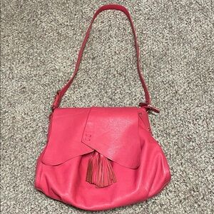 Pink leather fold over flap tassell accented Shoulder/crossbody  Bag